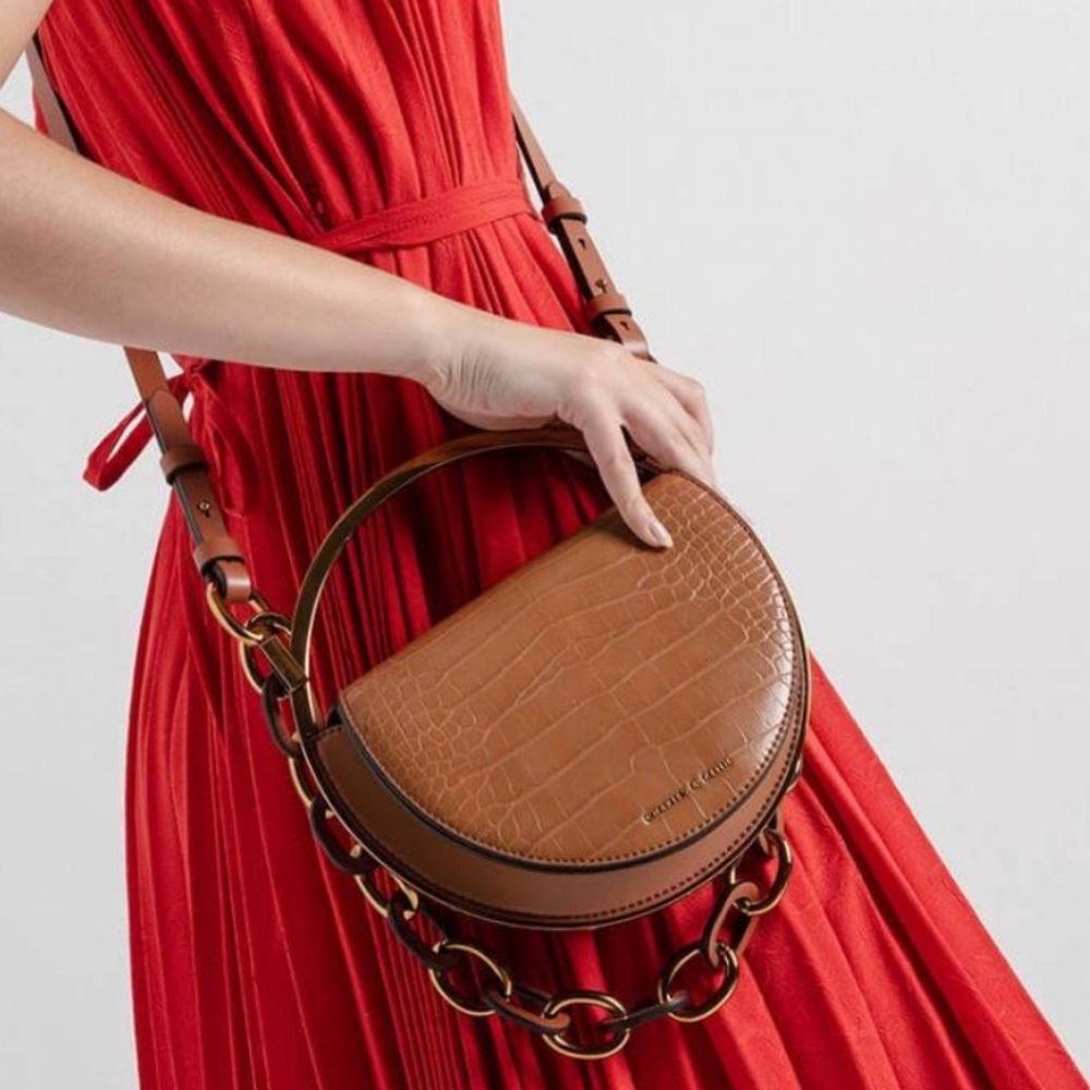 Charles & Keith Brown Croc-Embossed Half Moon Crossbody Bag